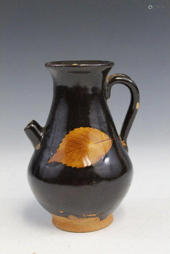 Chinese pottery pitcher.