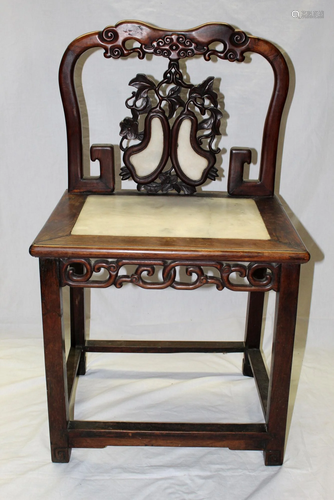 Chinese carved hardwood chair with marble top.