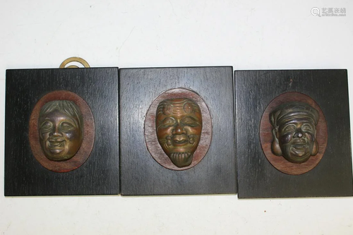 Three Japanese Metal Masks.