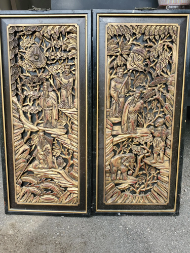 Pair of Chinese carved wood panels.