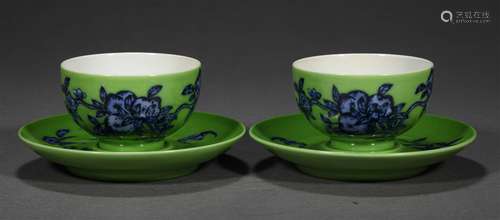 A PAIR OF QING DYNASTY BLUE AND WHITE SAN DUO TEACUPS WITH S...