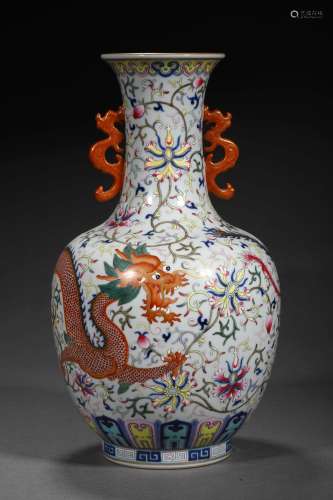 A QING DYNASTY CLASHING COLOR IRON-RED DRAGON GRAIN ORNAMENT...