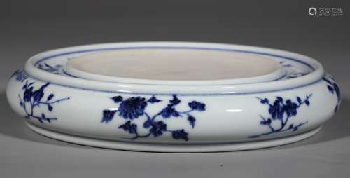 A MING DYNASTY BLUE AND WHITE FLOWER INKSTONE