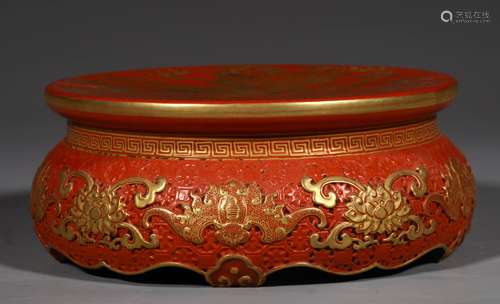 A QING DYNASTY IRON-RED DRAGON GRAIN BASE