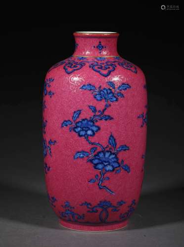 A QING DYNASTY BLUE AND WHITE CARMINE RED BOTTLE