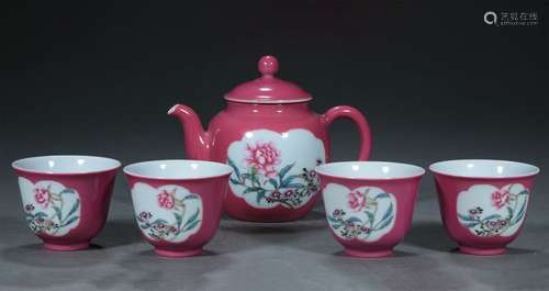 A SET OF QING DYNASTY CARMINE RED CONSECRATION FLOWER CUPS