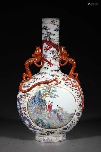 A QING DYNASTY FAMILLE ROSE DRAGON FIGURE VASE