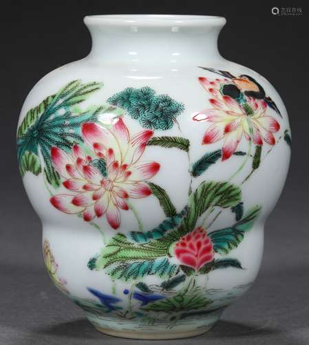 A QING DYNASTY FAMILLE ROSE LOTUS ROOT BOTTLE