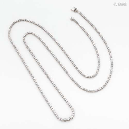 LONG SAUTOIR En or gris serti de diamants ronds. Longueur : ...