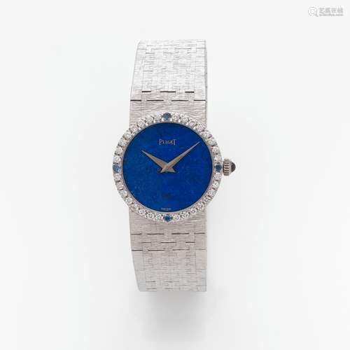 PIAGET MONTRE BRACELET DE DAME En or gris, le fond en lapis ...