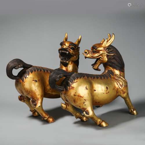 Chinese pair of bronze gold gilded kirins
