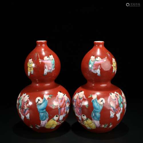 Chinese pair of famille rose porcelain bottles