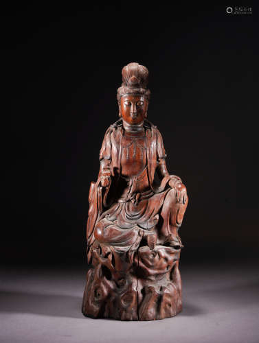 A wood statue of Guanyin