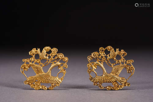 A pair of gilt-bronze ornament