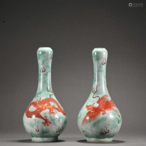 A pair of flambe 'dragon and phoenix' vase