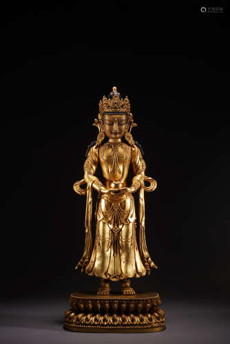 A gilt-bronze statue of bodhisattva