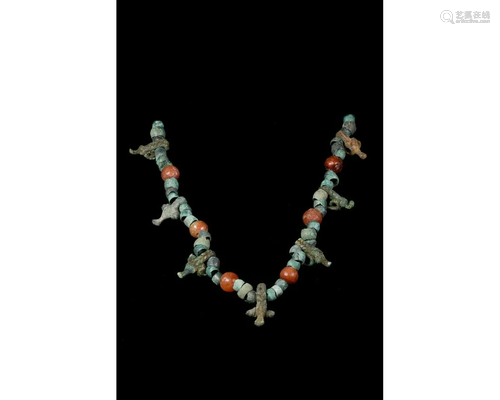 BRONZE AGE NECKLACE WITH AMULETS