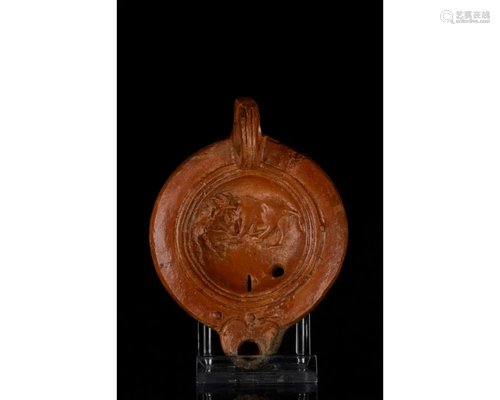 ROMAN TERRACOTTA OIL LAMP WITH LION ATTACKING WOLF