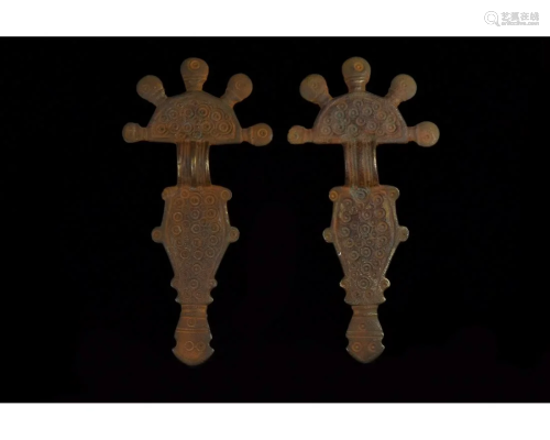 PAIR OF VISIGOTHIC RADIATE HEADED BOW BROOCHES