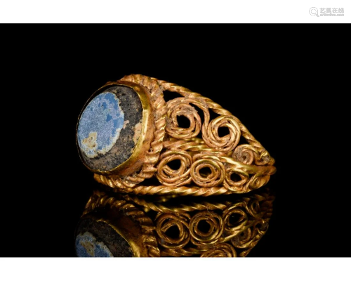 LATE ROMAN GOLD AND GLASS RING - EX CHRISTIES