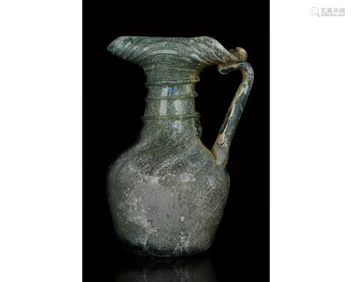 ROMAN GLASS JUG WITH HANDLE AND TRAIL