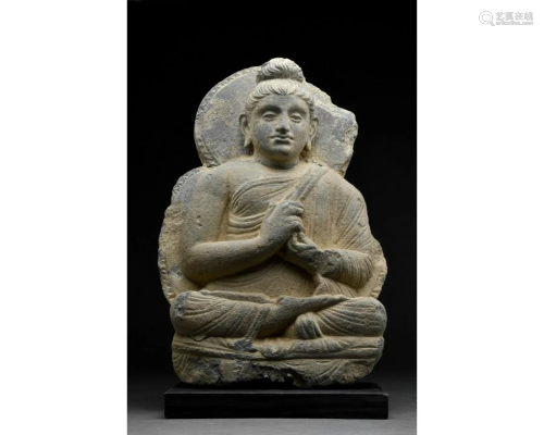 GANDHARA SCHIST FIGURE OF SEATED BUDDHA