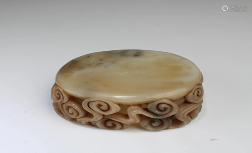 A Carved Soapstone Base