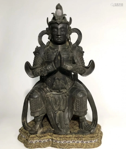 A CHINESE BRONZE STATUE