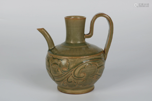 A CARVED CELADON-GLAZED WINEPOT.SONG PERIOD