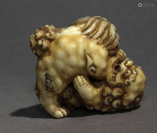 An early 19th century Japanese netsuke from Edo period. Sign...