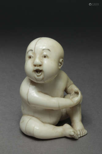 A 19th century Japanese netsuke from Edo period. Signed Toku...