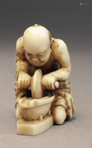 A mid 19th century Japanese netsuke from Edo period. Signed ...