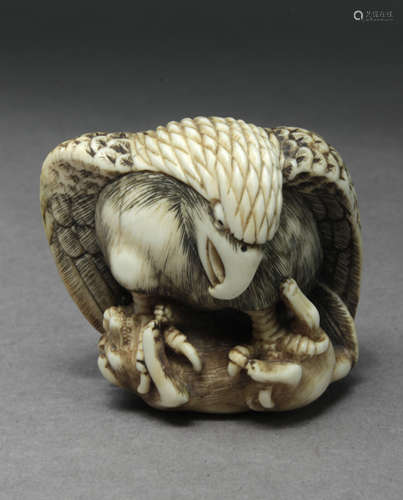 A late 19th century Japanese netsuke from Meiji period. Sign...