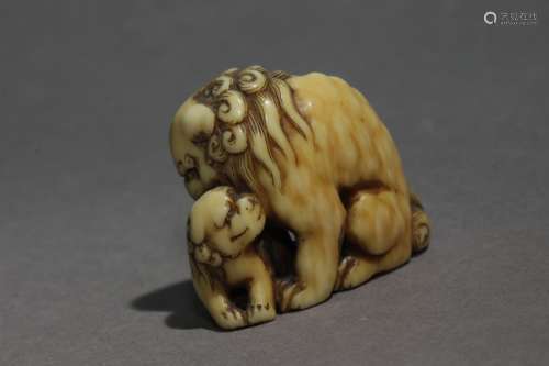 An early 19th century Japanese netsuke from Edo period, Sign...
