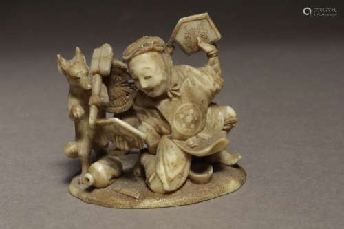 A mid 19th century Japanese netsuke from Edo period. Signed ...