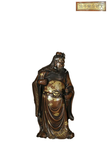 A PARCEL-GILT BRONZE FIGURE OF GUANYU