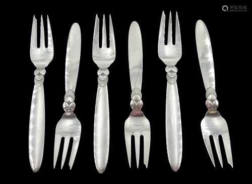 Set of six silver cake forks
