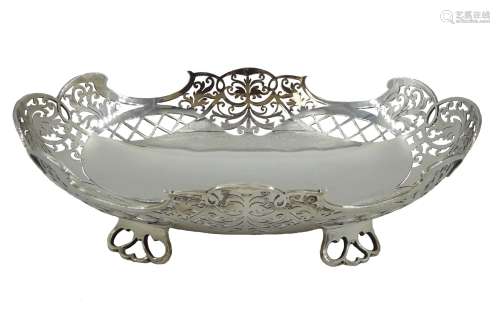 Silver oval basket with pierced decoration on four feet by V...