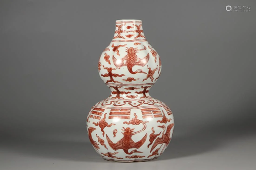 A RED GLAZED 'BAGUA AND ANIMALS' DOUBLE GOURD VASE