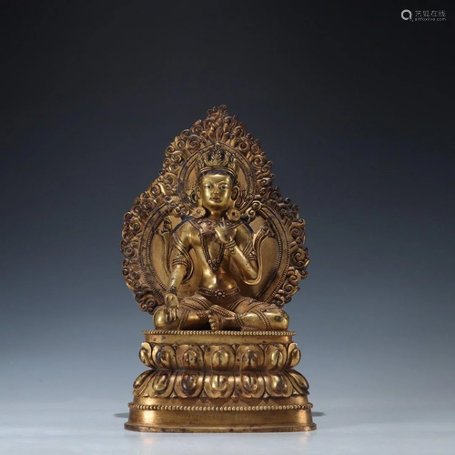 A GILT BRONZE FIGURINE OF TARA BUDDHA