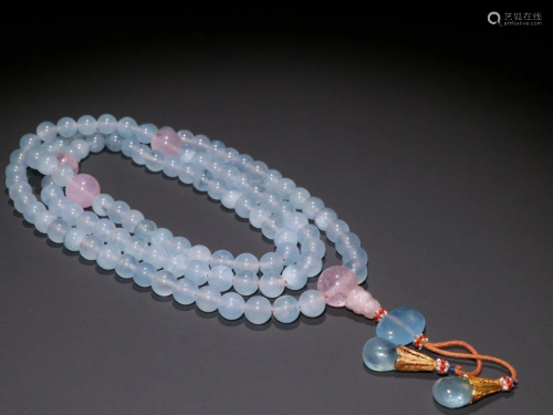 A STRING OF AQUAMARINE NECKLACE