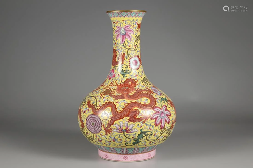 A JAUNE GROUND FAMILLE ROSE DRAGON PORCELAIN VASE