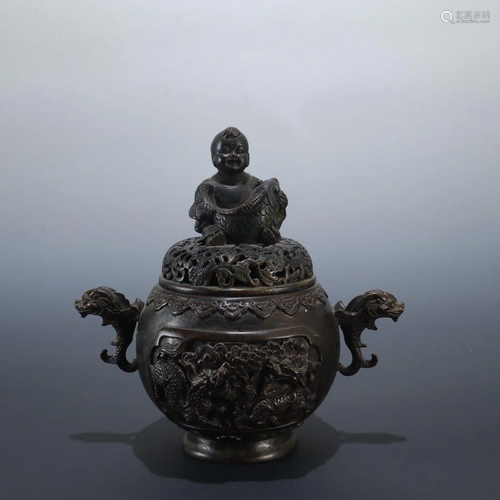 A LIDDED OPENWORK BRONZE INCENSE BURNER