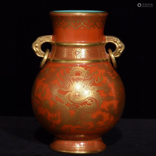 A CORAL RED GROUND GOLD PAINTED DRAGON VASE