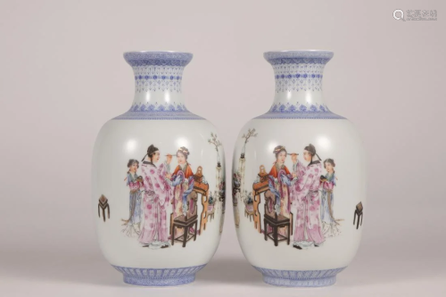 A PAIR OF CHINESE FAMILLE ROSE 'NARRATIVES' VASES