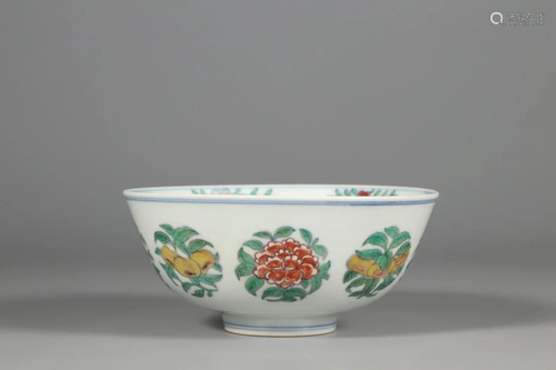 A FAMILLE ROSE 'FLOWERS AND FRUITS' BOWL