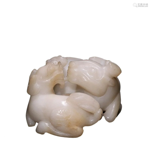 A HETIAN JADE â€™QILIN AND OX â€™ CARVING