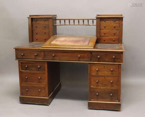 A 19TH CENTURY MAHOGANY PEDESTAL DESK, the superstructure wi...