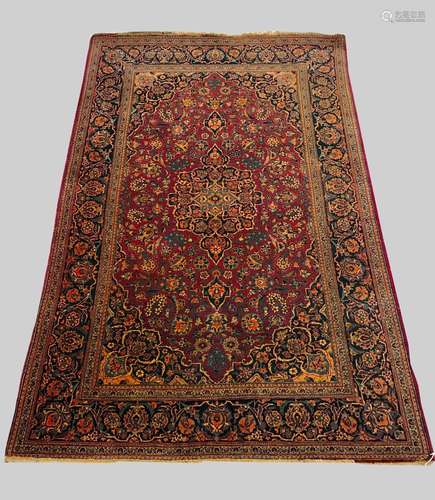 A KASHAN RUG, Central Iran, c.1930, the raspberry field of v...