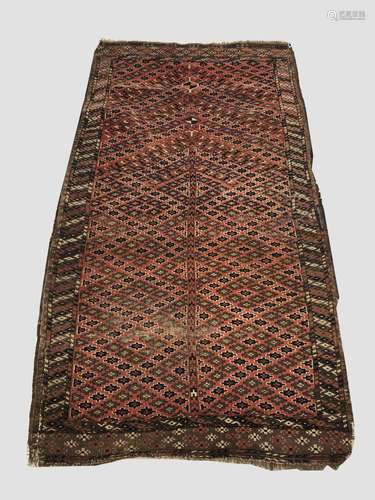 A CHODOR TURKMEN PRAYER RUG, c 1880, the brick red diamond l...